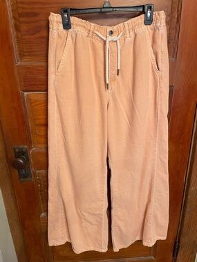 Pilcro Adi Mid-Rise Pull-On Flare Pants in Salmon Color